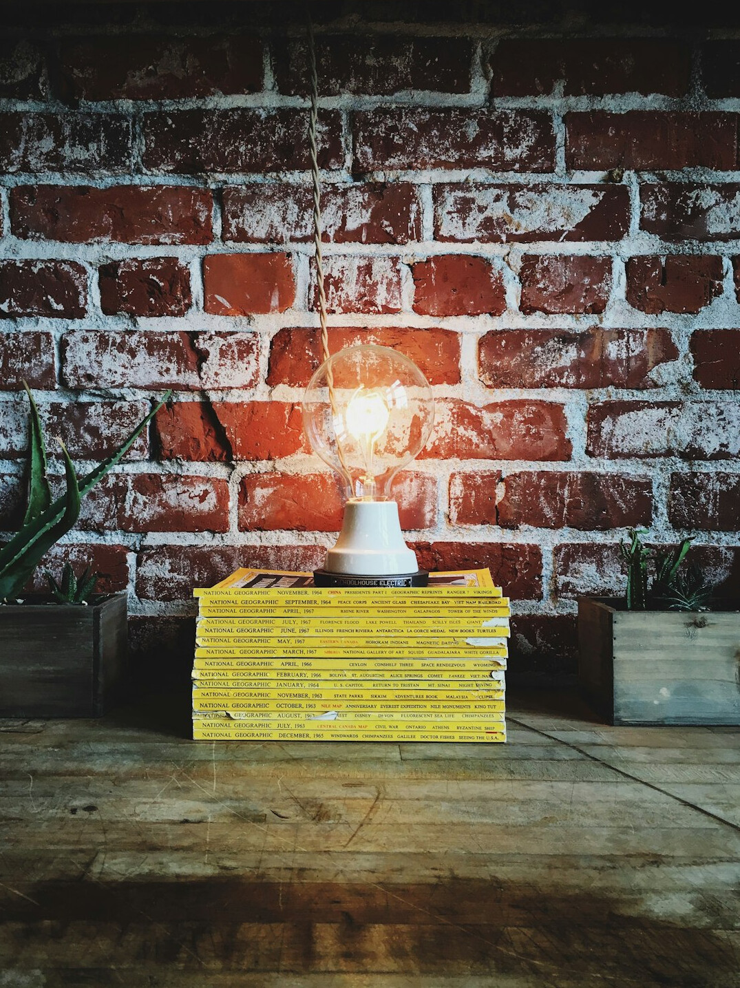 Stack of books with a lamp