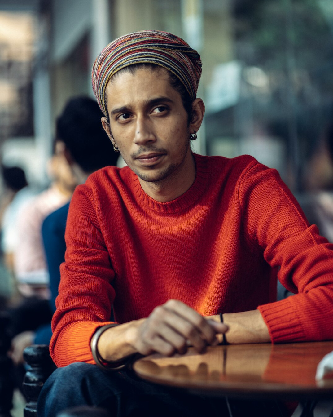 Portrait of a young Hispanic man fact checker